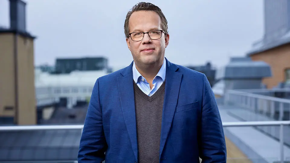 Martin Linder i blå kavaj