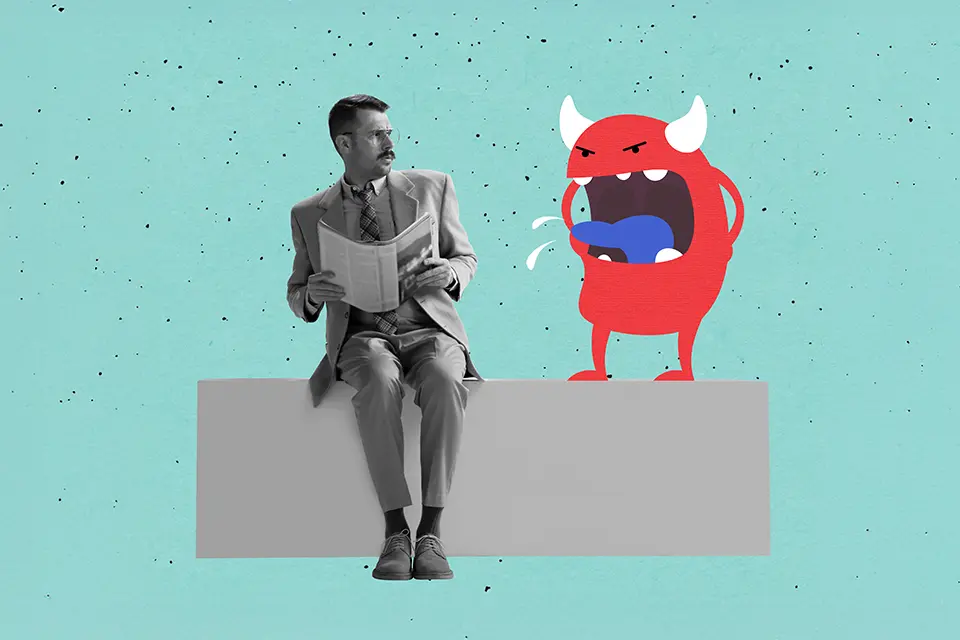 Man som sitter och läser tidning, blir utskälld av monster