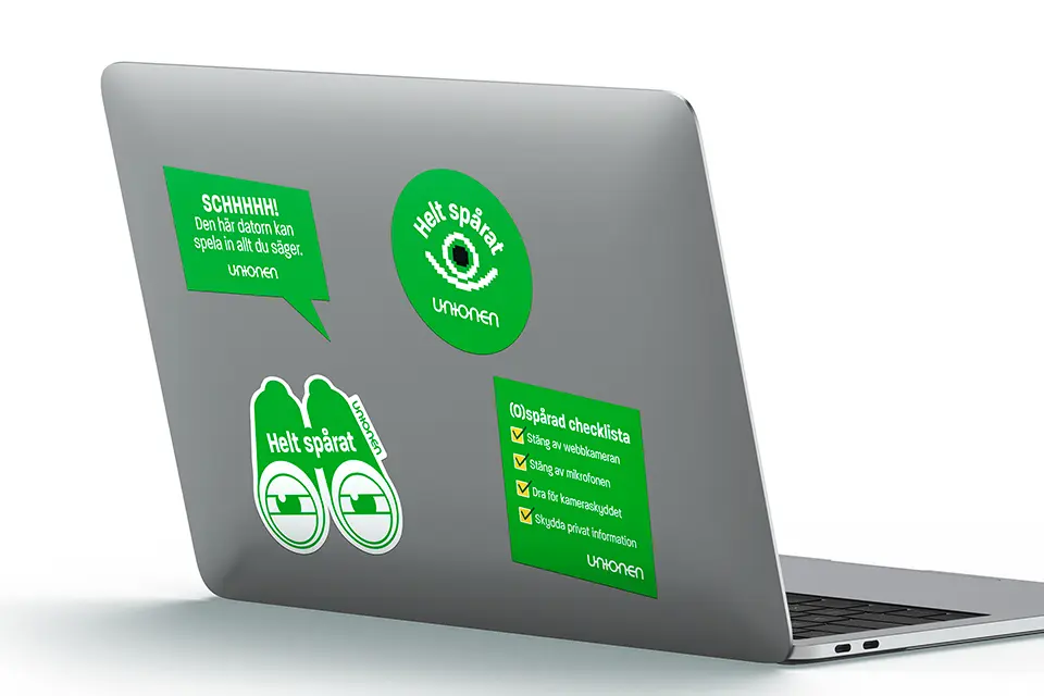 Bild på dator med olika kampanjklistermärken från kampanjen