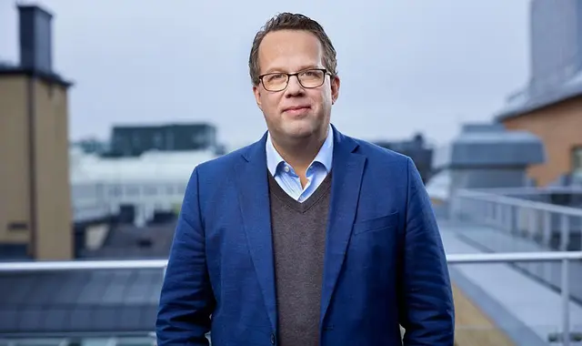 Martin Linder i blå kavaj