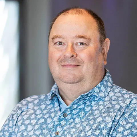 Porträttbild på James Jolly